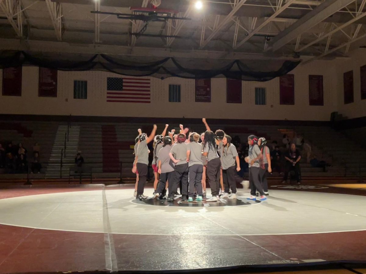 SHS Girls Wrestling team getting ready to fight their first home match against William Allen High School.