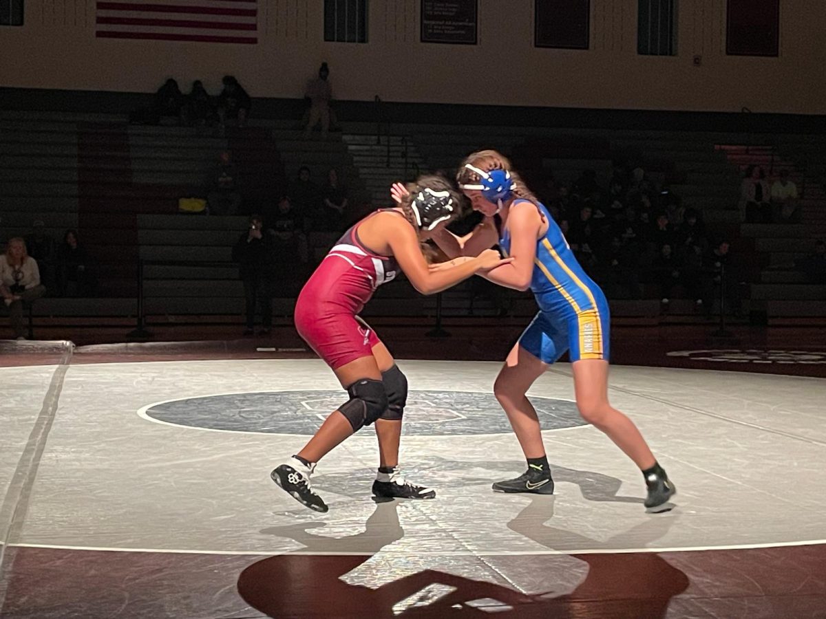 Amie Garcia, '25, fighting her opponent opponent from William Allen High School.