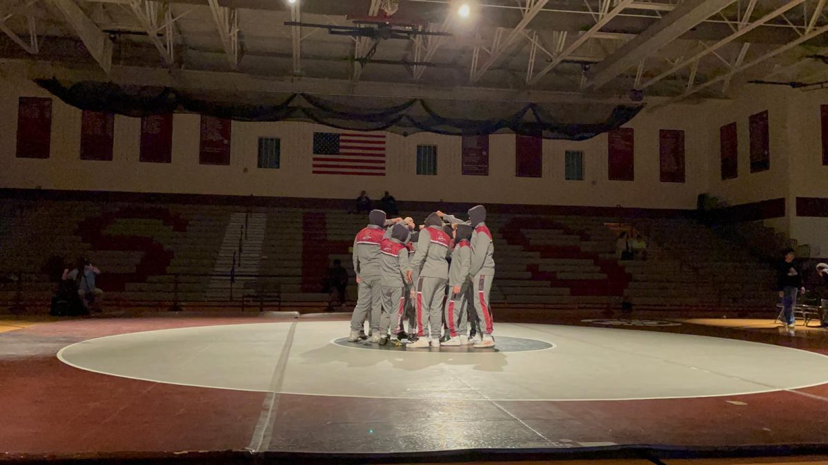 SHS Boys Wrestling team getting ready to fight against their opponents from William Allen High School.