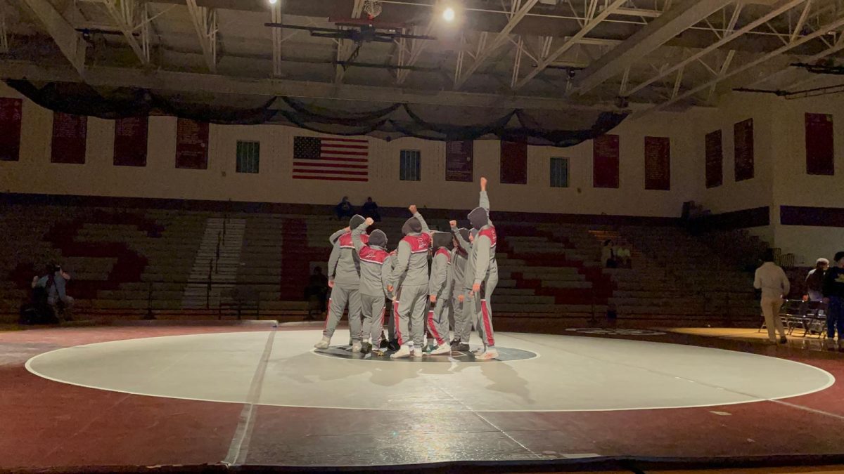 SHS Boys Wrestling team getting ready to fight against their opponents from William Allen High School.