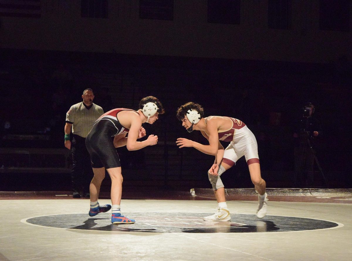 Jack Jasionowicz, '26, ready to wrestle his opponent from Northampton High School.