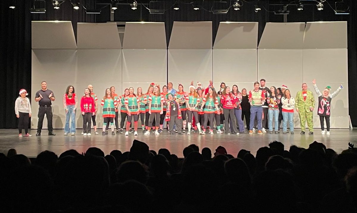 Every staff member that participated in the Holiday Show posing for a picture at the end of the performances.