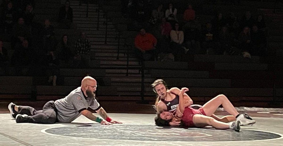 Jordyn Kollien, '27, engaged in an intense fight against her opponent from Northampton Area High School.