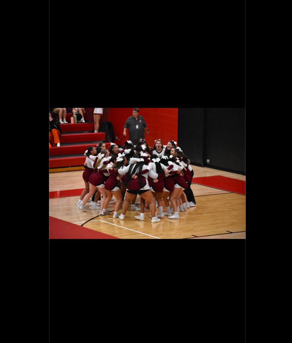 SHS Cheerleaders chanting before their big debut at Districts Competition. 
