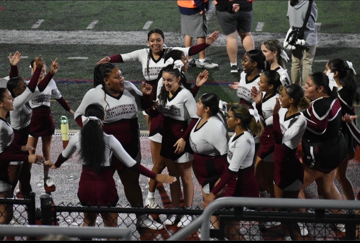 SHS Cheerleaders get hype during halftime at a football game. 