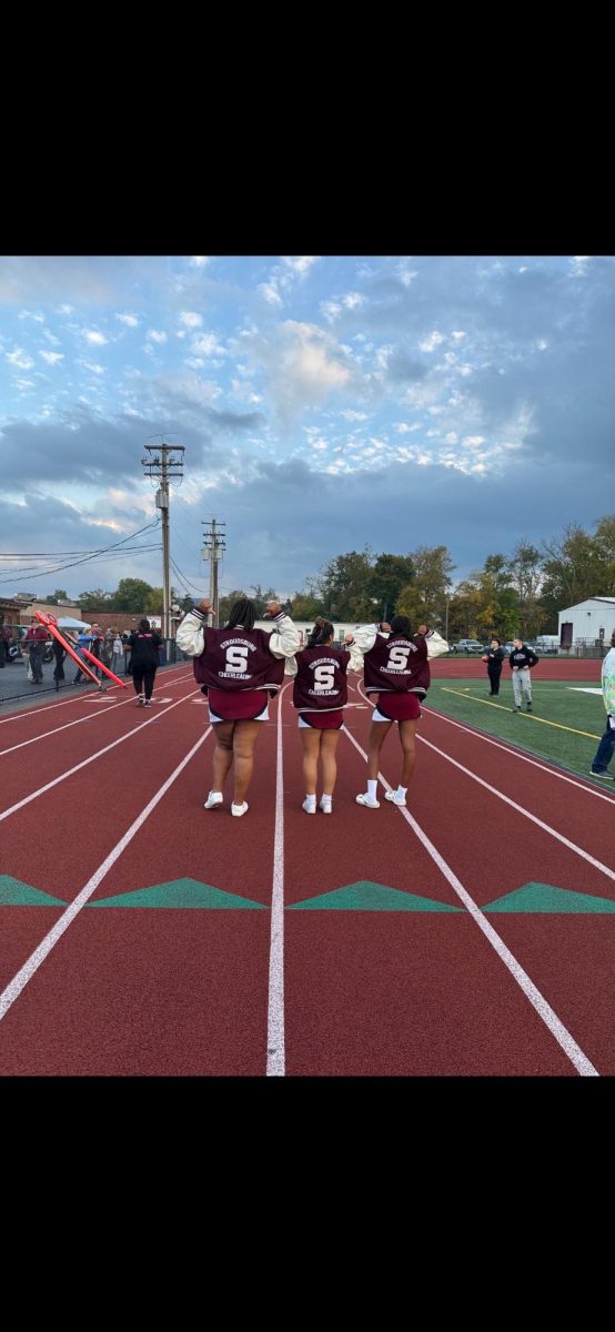 Tajayla,Katie, and Makenzie showing off their varsity jackets. 