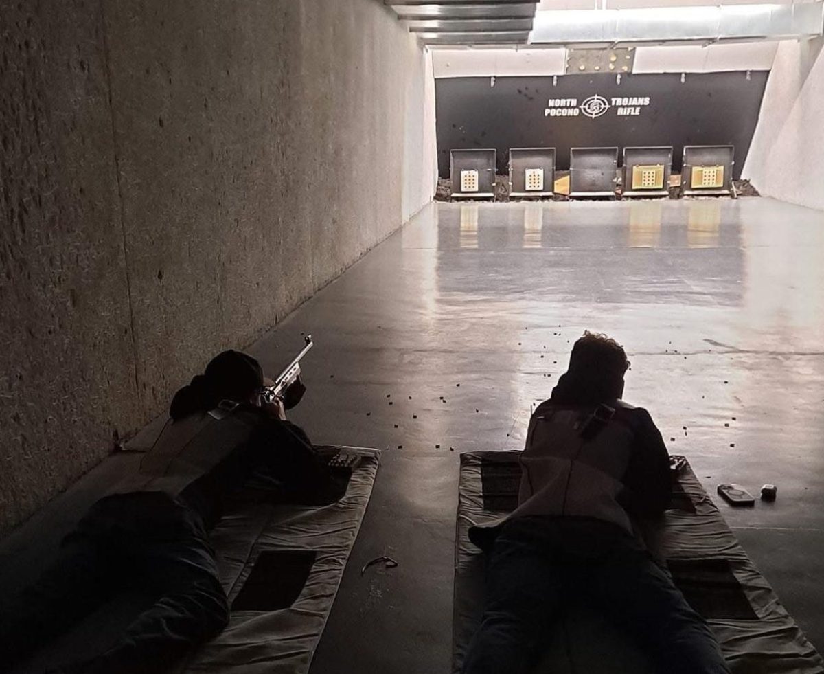 Stroudsburg Rifle members Gavin Dunkelberger,  '25, and Zachary Fritz,  '26, getting ready to shoot.