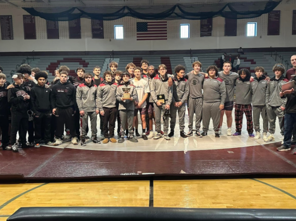 Stroudsburg Wrestling team posing for a group picture after winning the Pocono Cup.