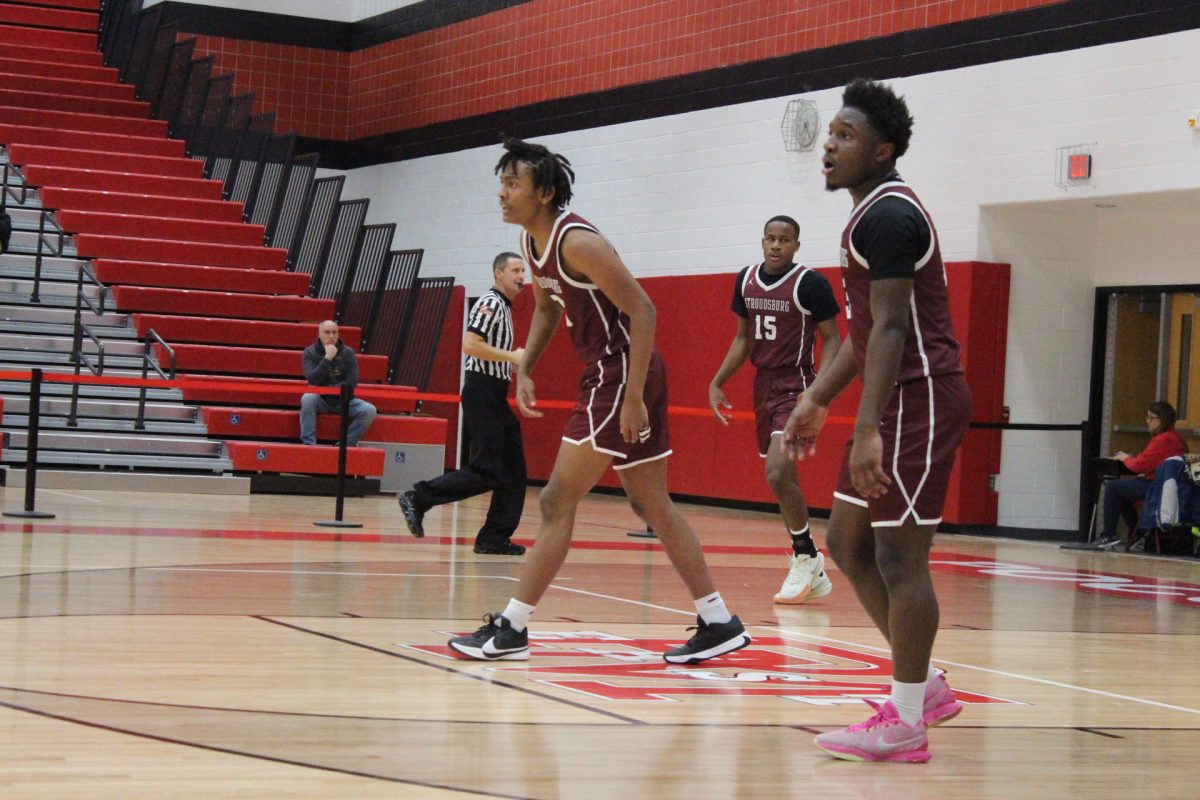 Marvin Dorvilus, '25, talking to his team on defense