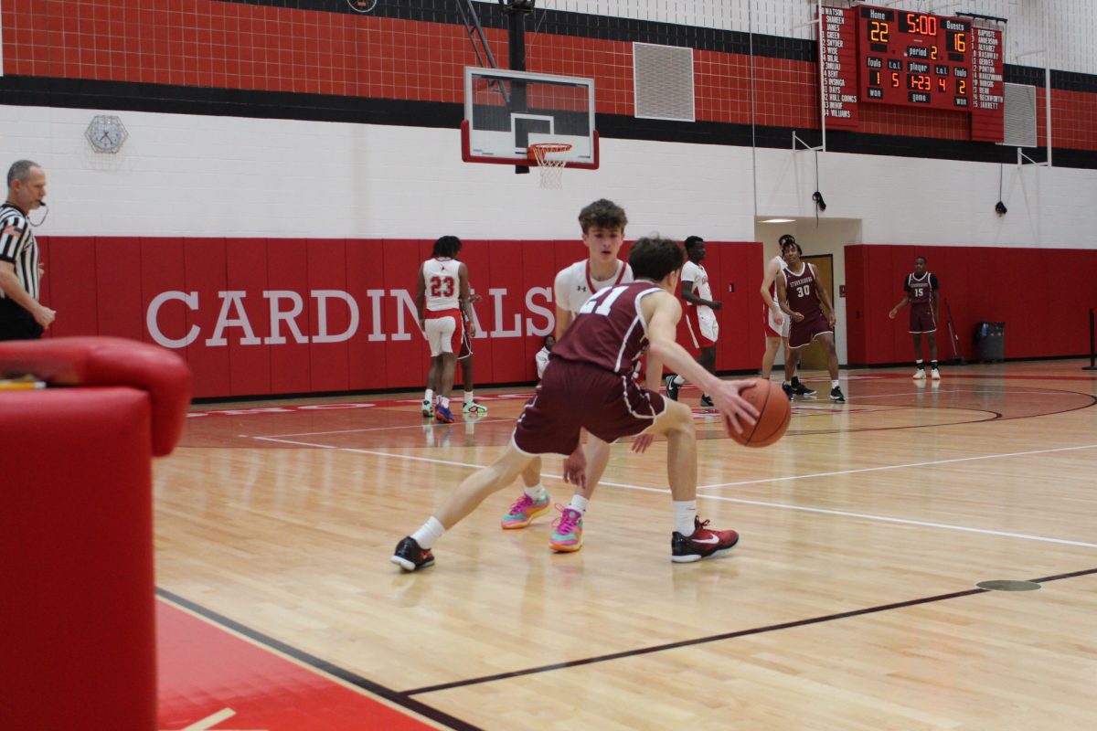 Tae El-Bassiouni, '28, crossing over his defender