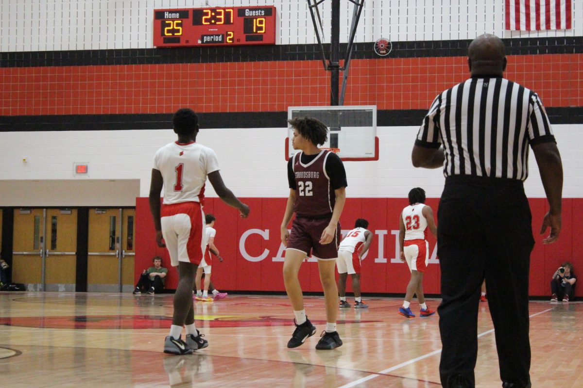 Brandon Quintana, '27, getting back on defense.