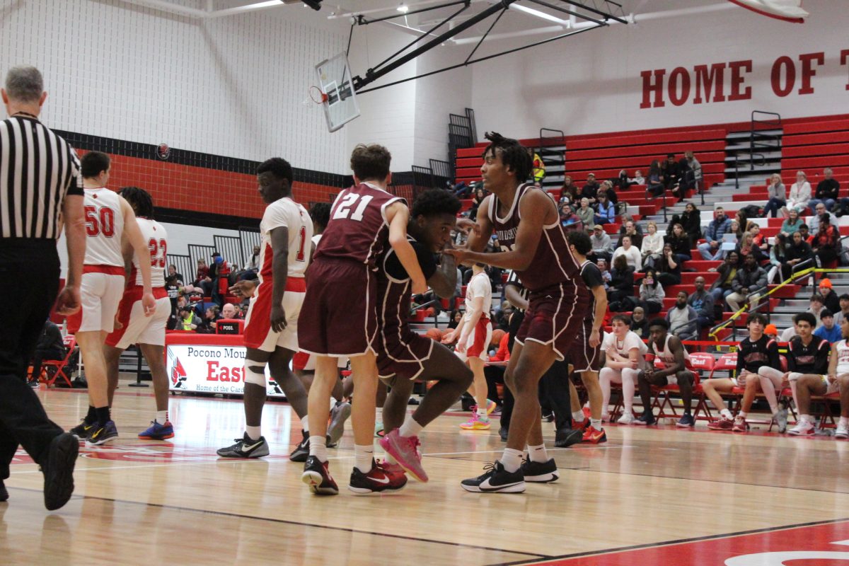 Kameron Knight, '26, cutting into the lane against Pocono Mountain East.