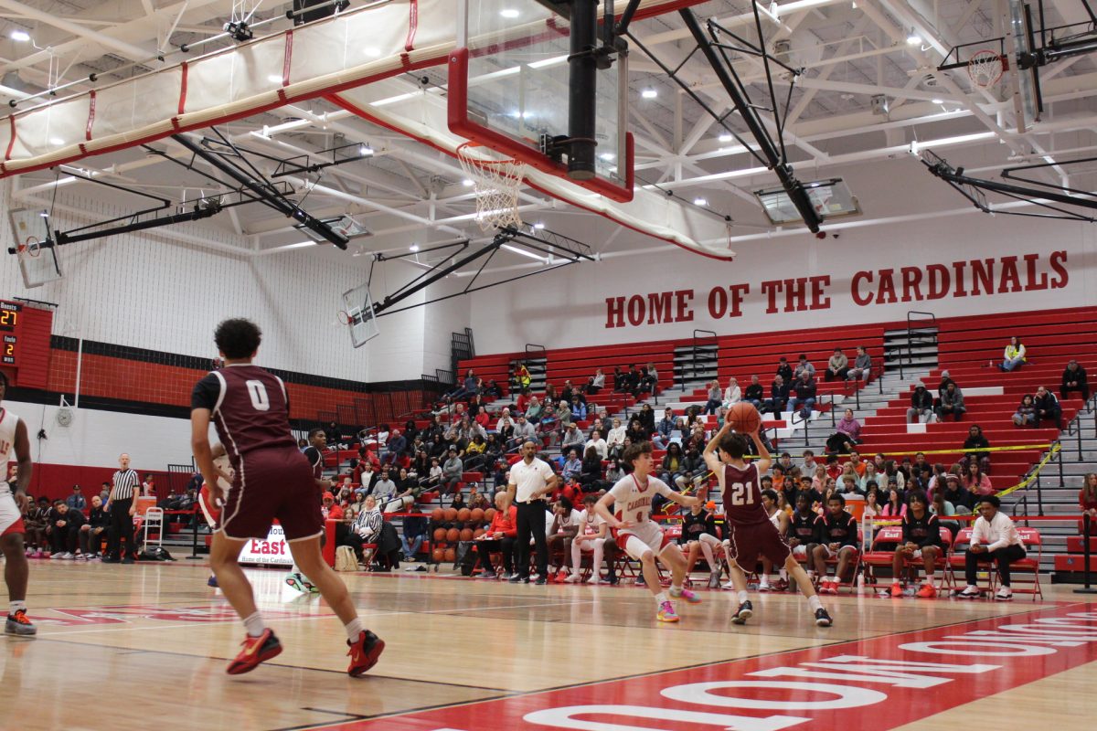 Tae El-Bassiouni, '28, taking the ball up the court