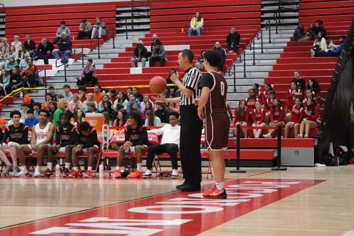 Alex Pacitti, '25, passes the ball inbounds.