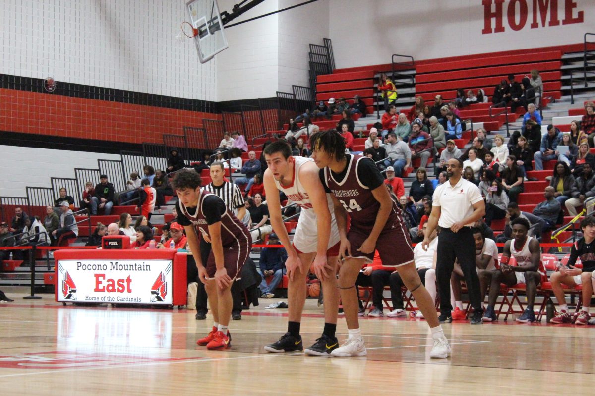 Marquise Long, '26, and Alex Pacitti, '25, lining up at the free throw line