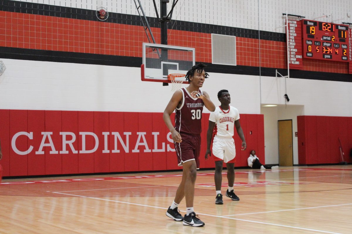 Center Marvin Dorvilus, '25, commanding the offense against Pocono Mountain East.