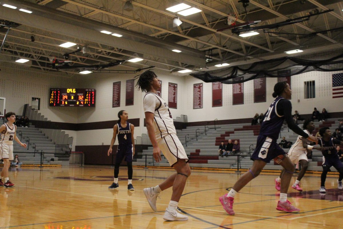 Marquise Long, '26, makes a 3-pointer.