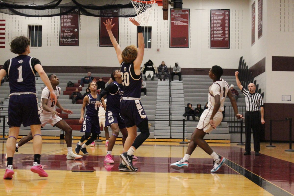 Jarel Jackson, '27, makes a reverse layup.