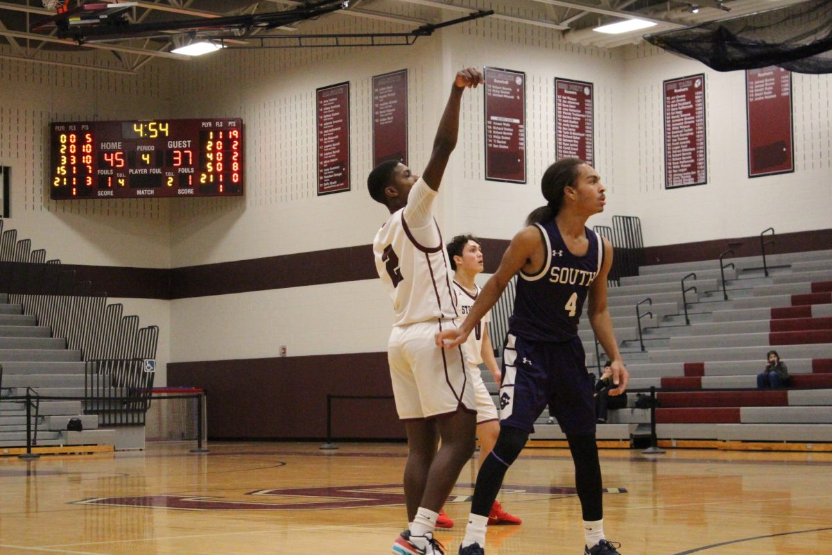 Jarel Jackson, '27, makes a 3- pointer.