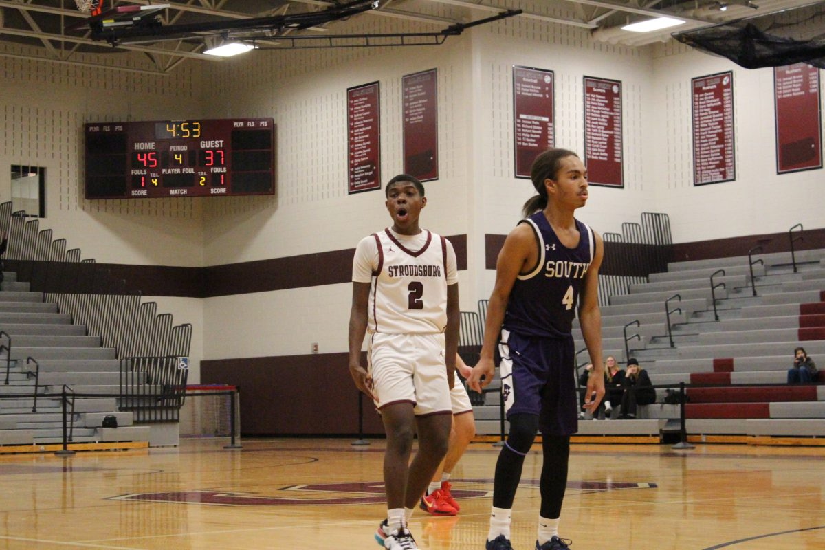 Jarel Jackson, '27, celebrating his 3- pointer.