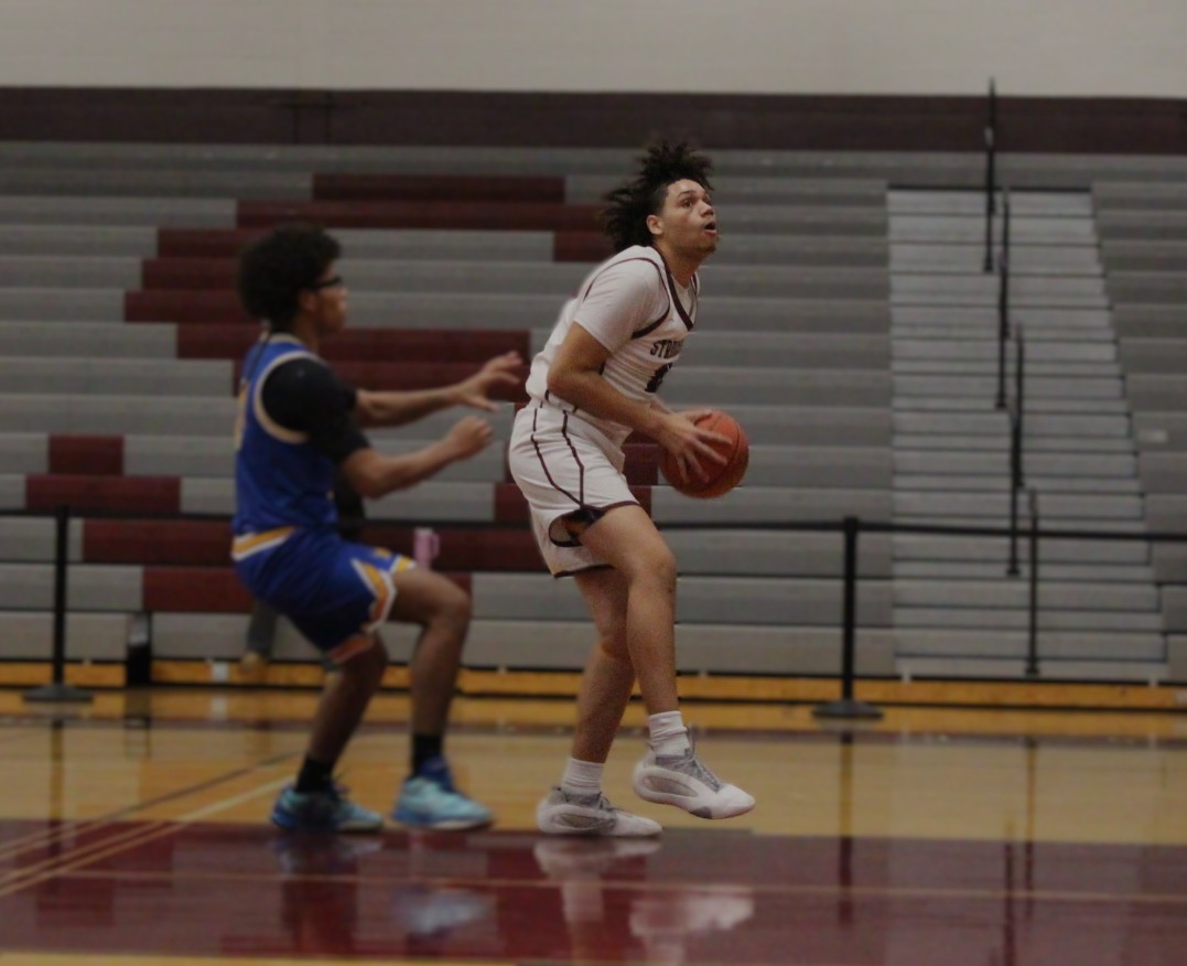 Brandon Quintana, '27, performing a spin move