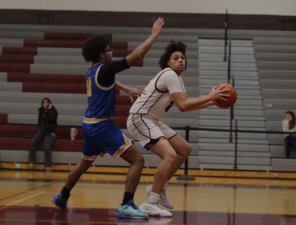 Brandon Quintana, '27, looking towards the basket