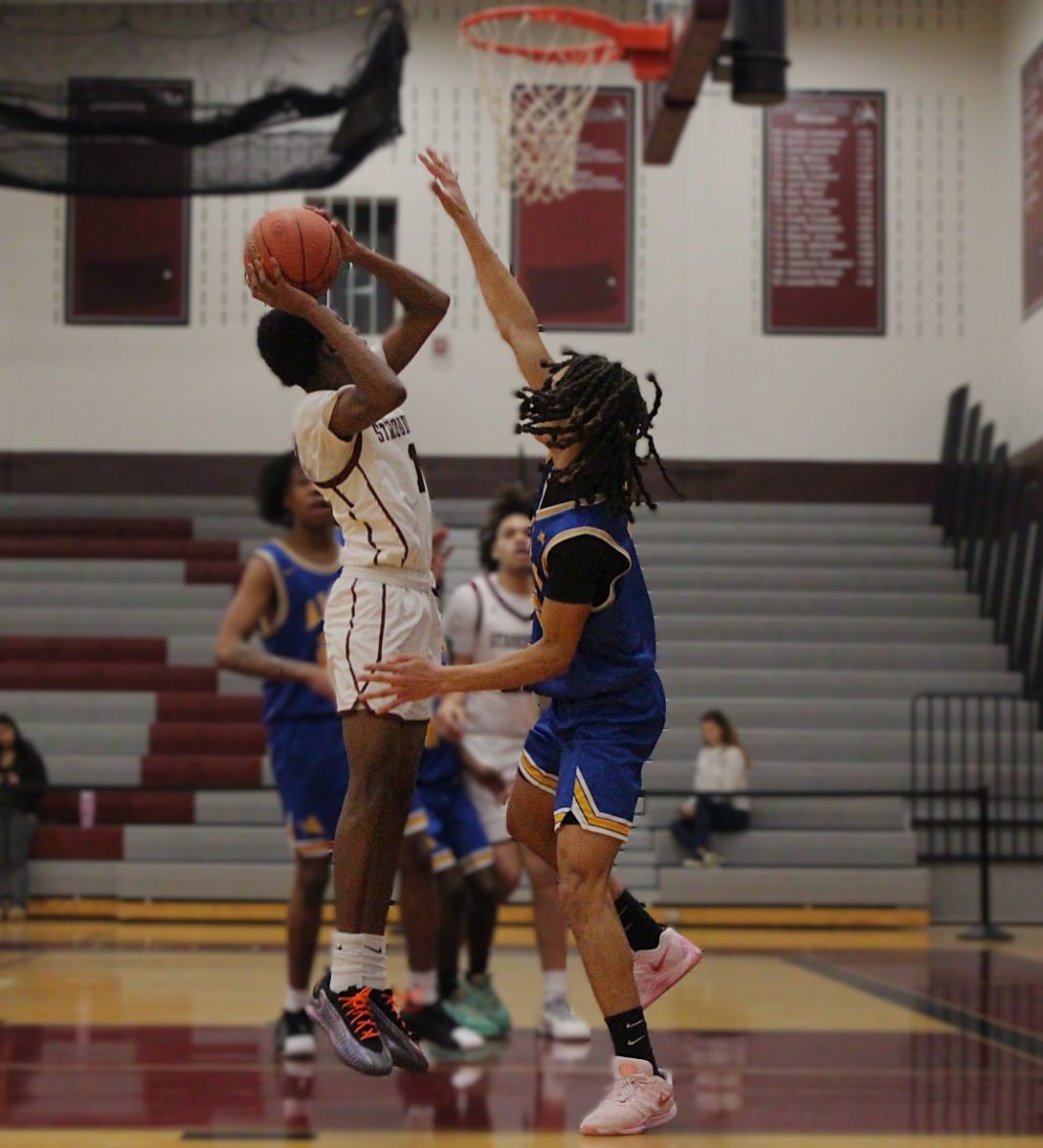 Nazir Williams, '26, going in for a layup