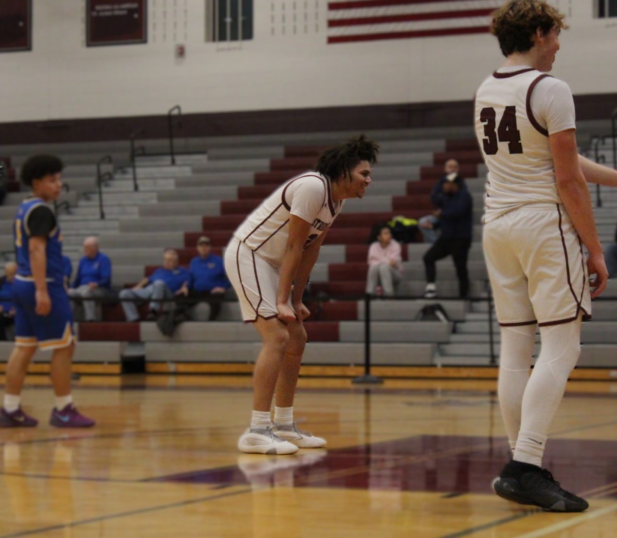 Brandon Quintana, '27, resting at the free throw line.