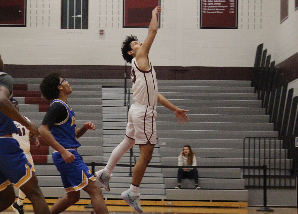 Essam Alrefai, '26, getting an offensive rebound