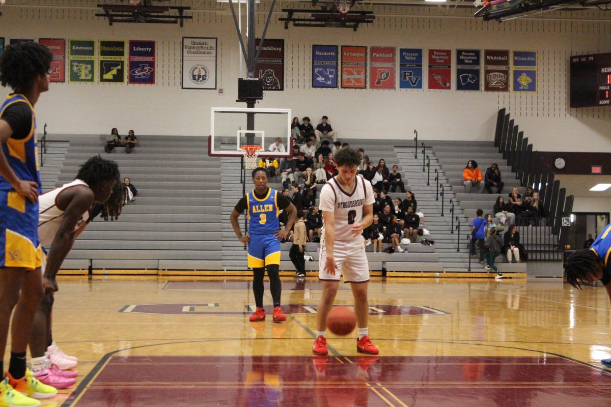 Alex Pacitti, '25, making a free-throw.