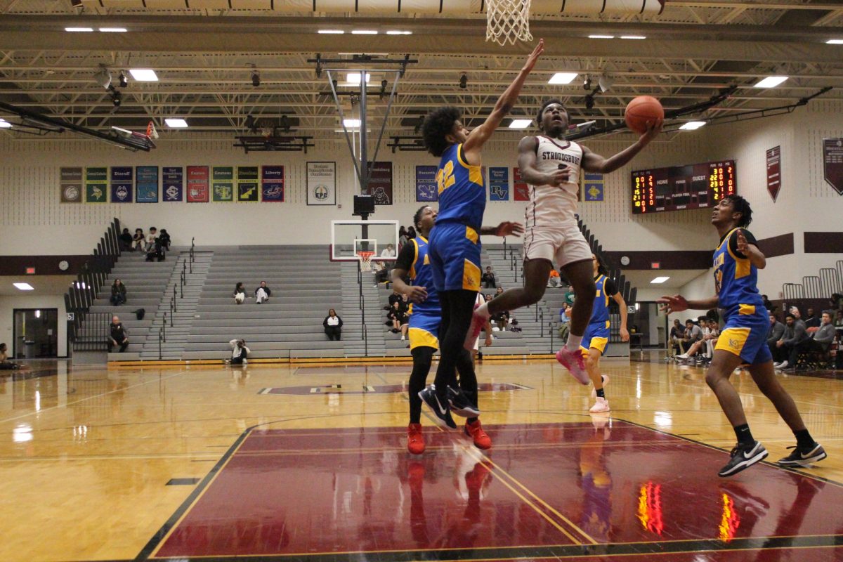 Kameron Knight, '26, making a lay up