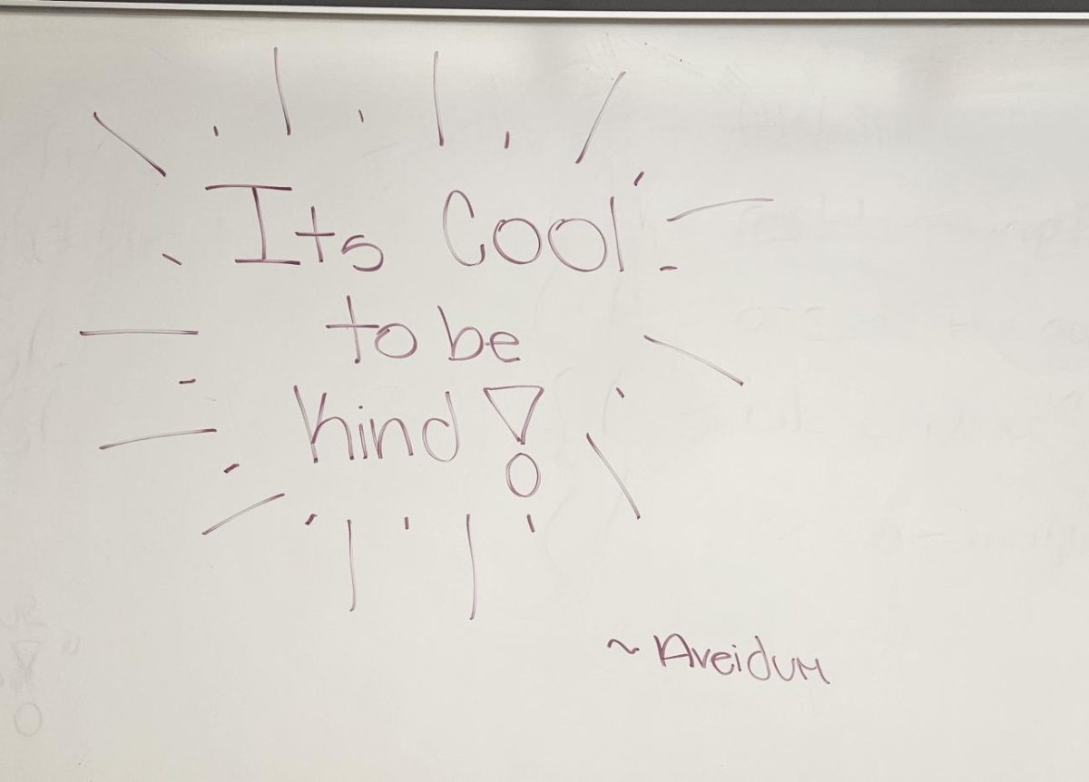 Aevidum members surprised teachers by placing positive messages on whiteboards in their classrooms. 