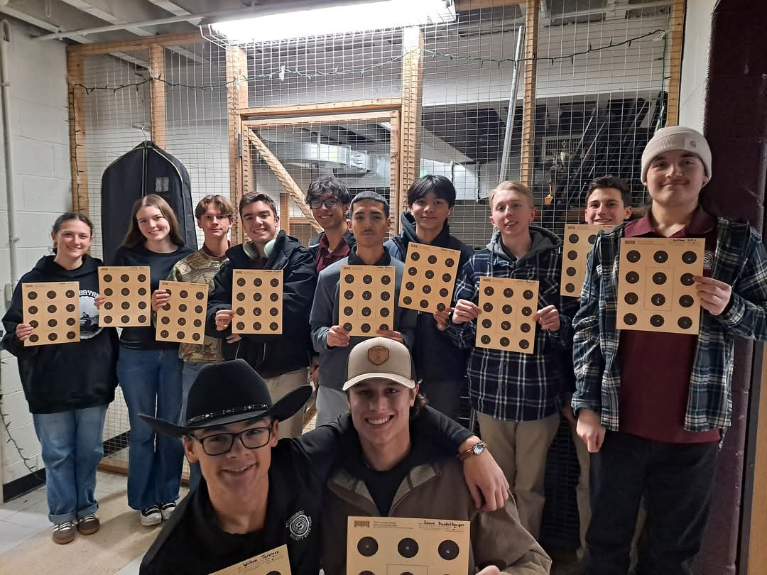 Stroudsburg Rifle team posing after win against Salisbury High School.