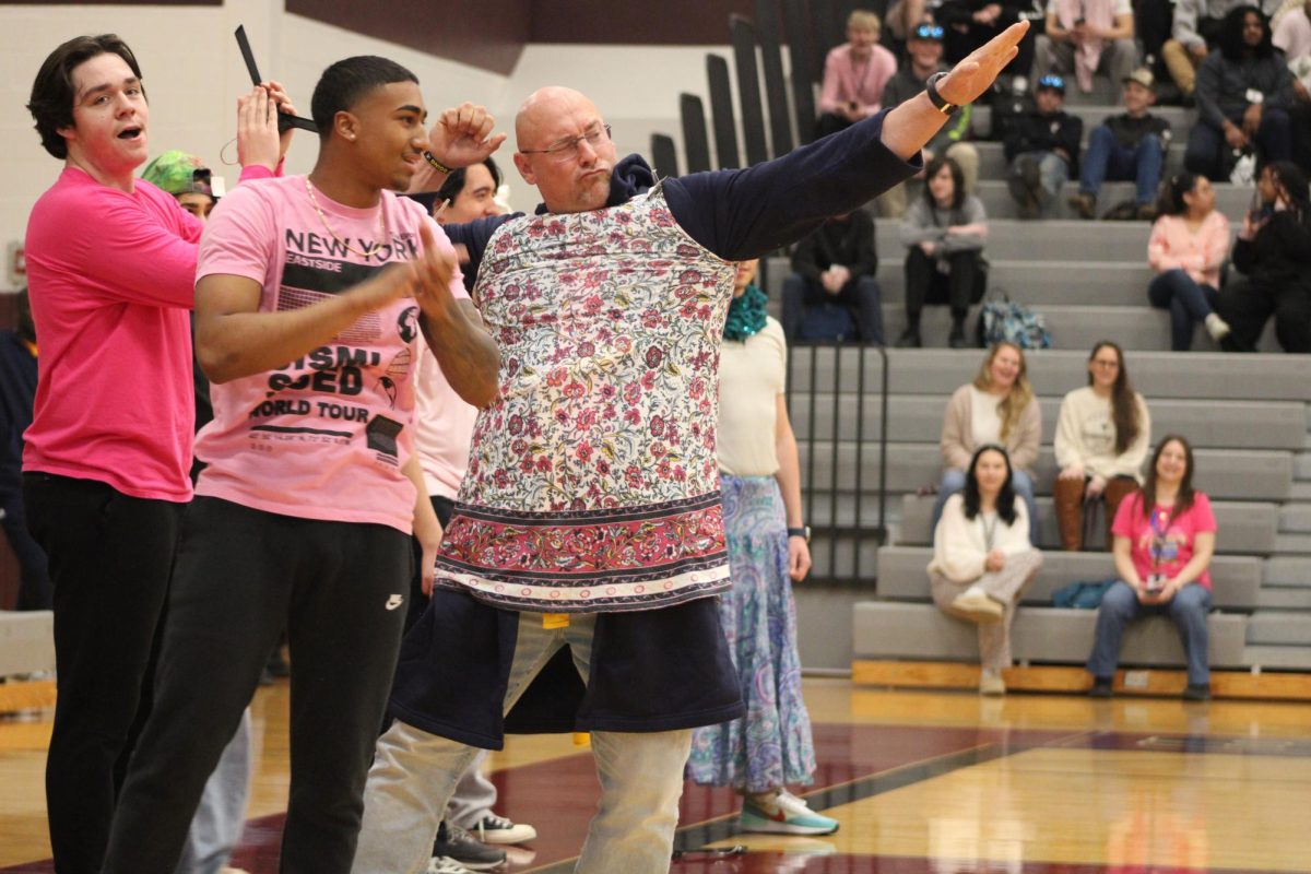 Mr.Perry rocking his dress, after being dressed by Anthony Knight, '25