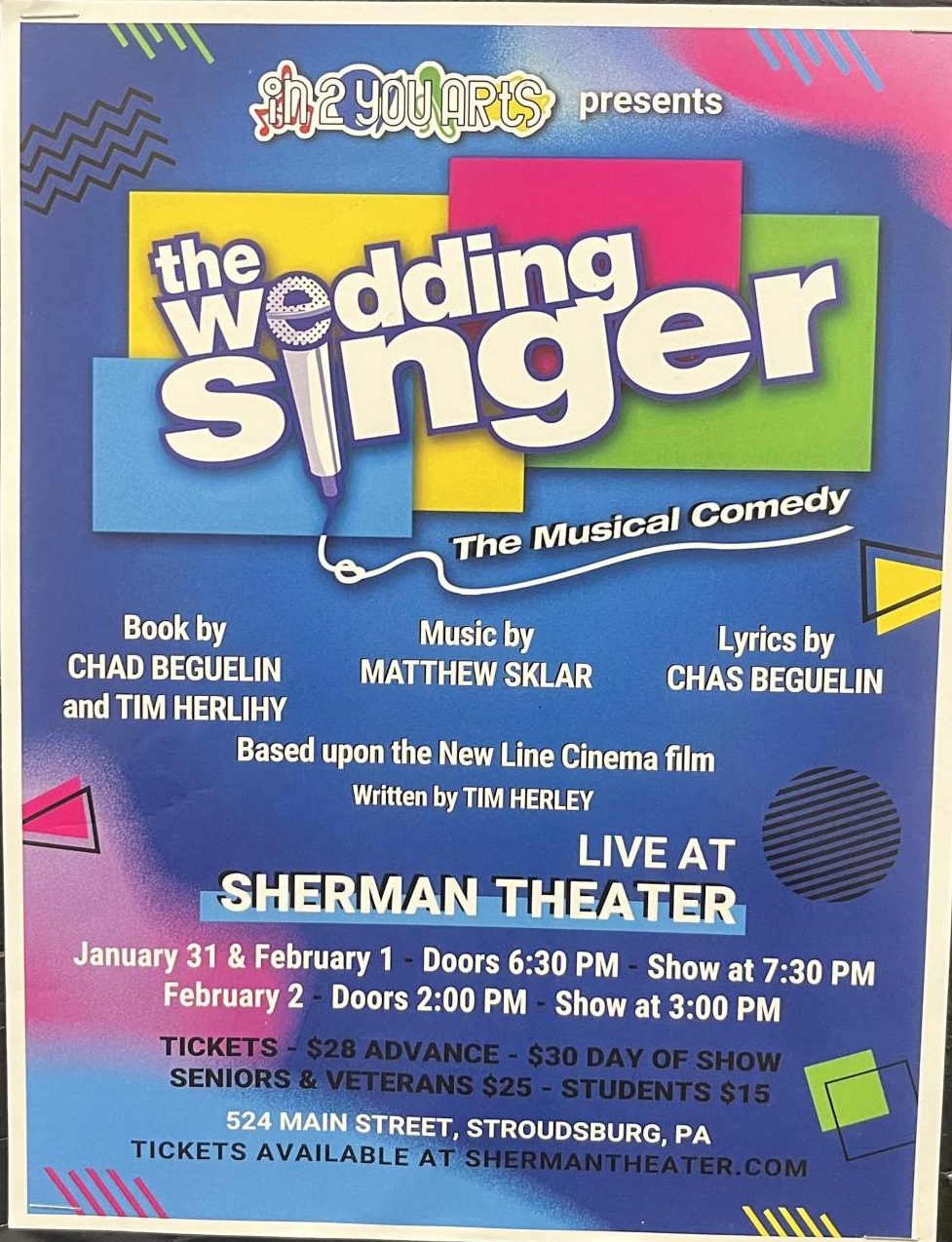 The Wedding Singer poster displayed all over the community