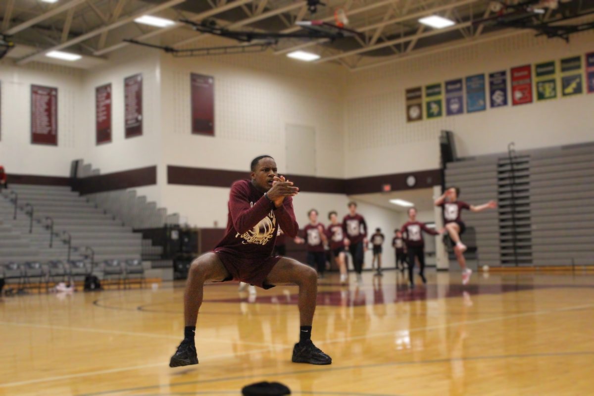 The sophomore class enters the gym.