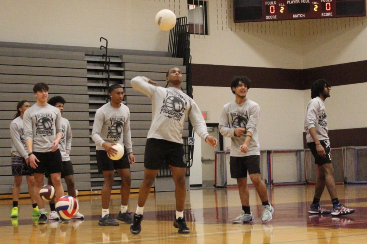 A member of the senior class team warms up.