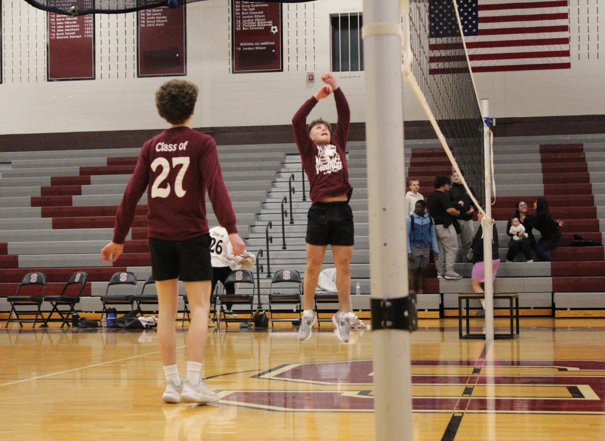 Jack MItchell, '27, prepares to spike the ball.