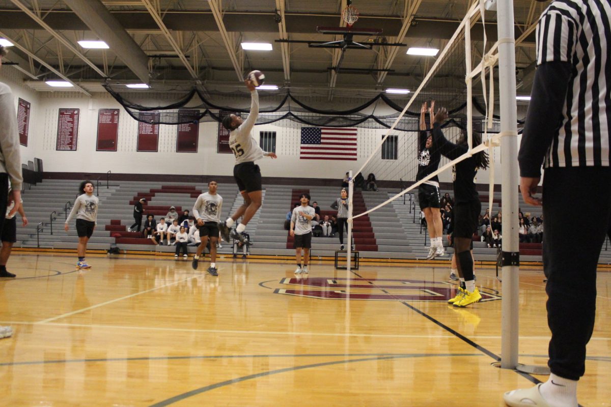 The ball gets hit over the net for a point.