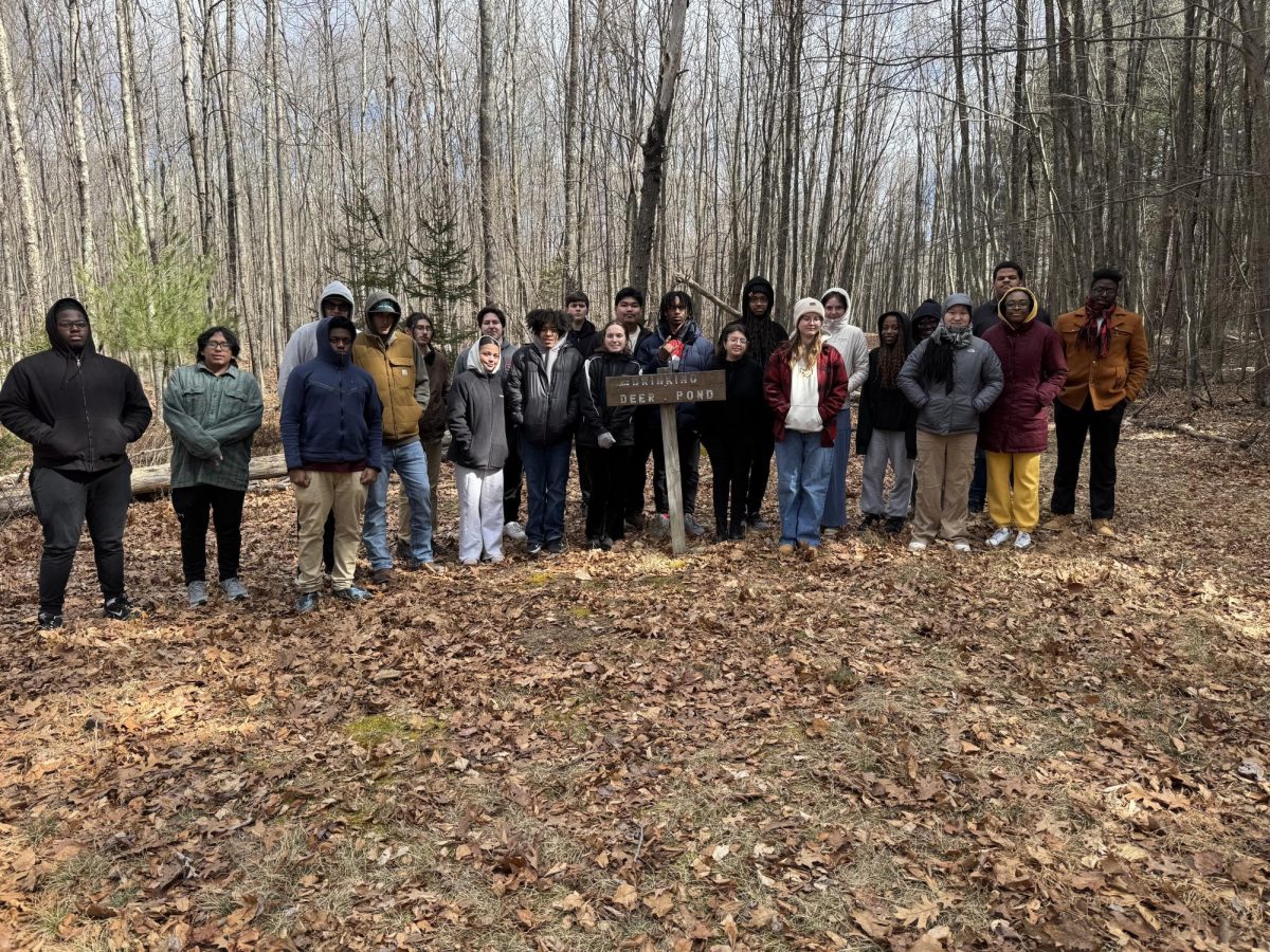 Students take a picture right before going on a hike through Drinking Deer Pond. Along the trail, they learn about specific wildlife and the parts of the land.