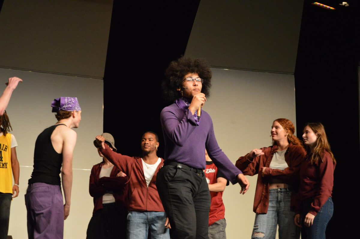 Nevan McCabe, '25, rapping his part in the Left Side Lyricists part of the rap battle.