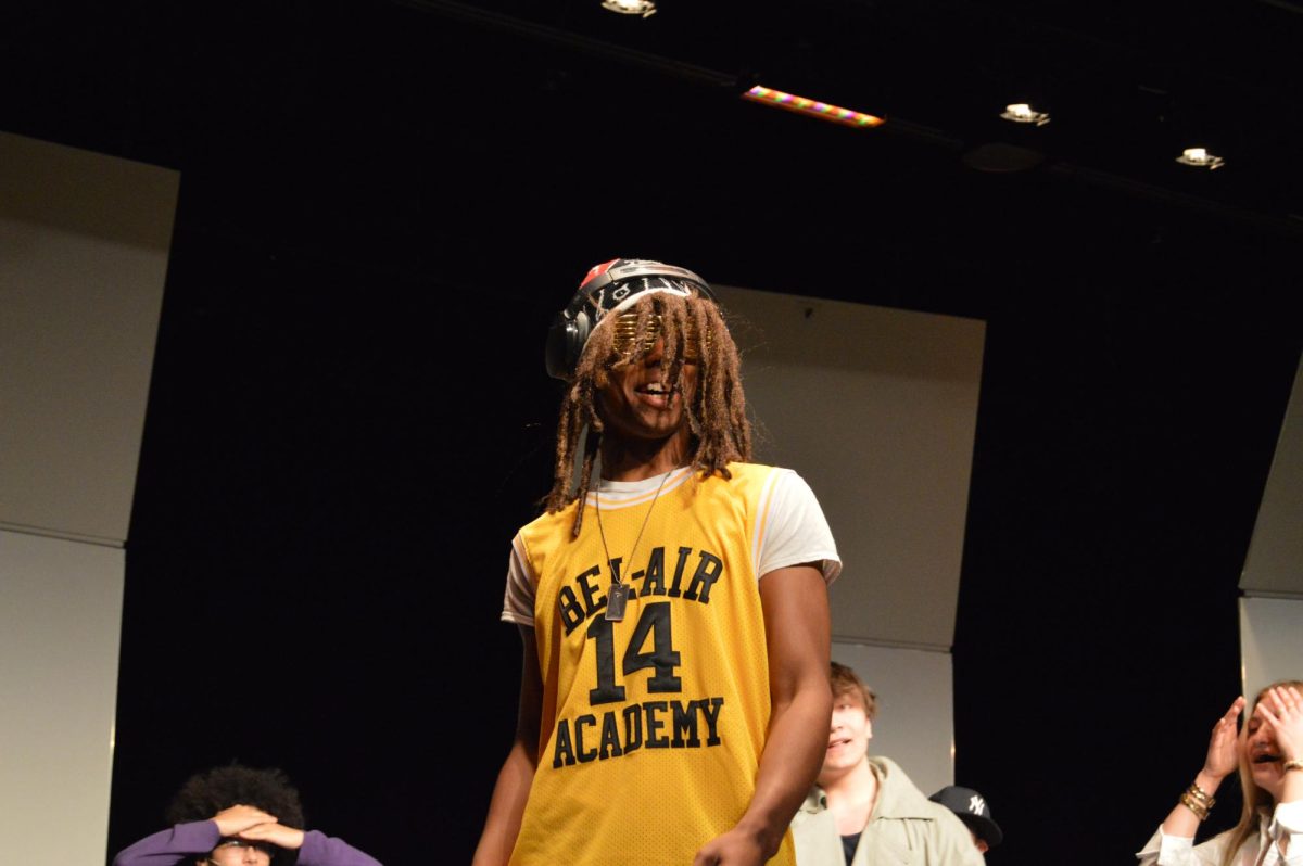 "Nonchalant Man" who was a crowd favorite played by Romeo Santana, '25, in "Rap, Romance, and Real Estate."