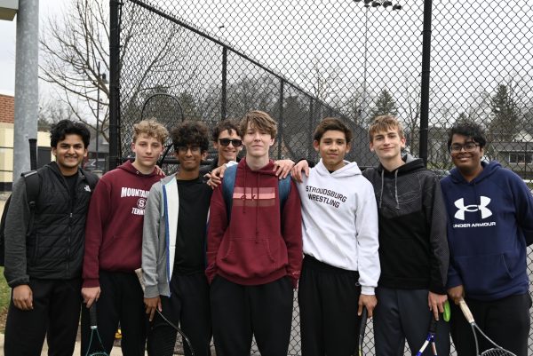 From left to right, Dhyey Savaliya, '26, Mason Ulmer, '27, Keshav Persaud, '26, Darius Quintana, '27, Tobias Ricks, '27, Memphis Rodriguez, '27, Ryan Rounsaville, '27, and Tyler Hanna, '25, pose after their last team practice.