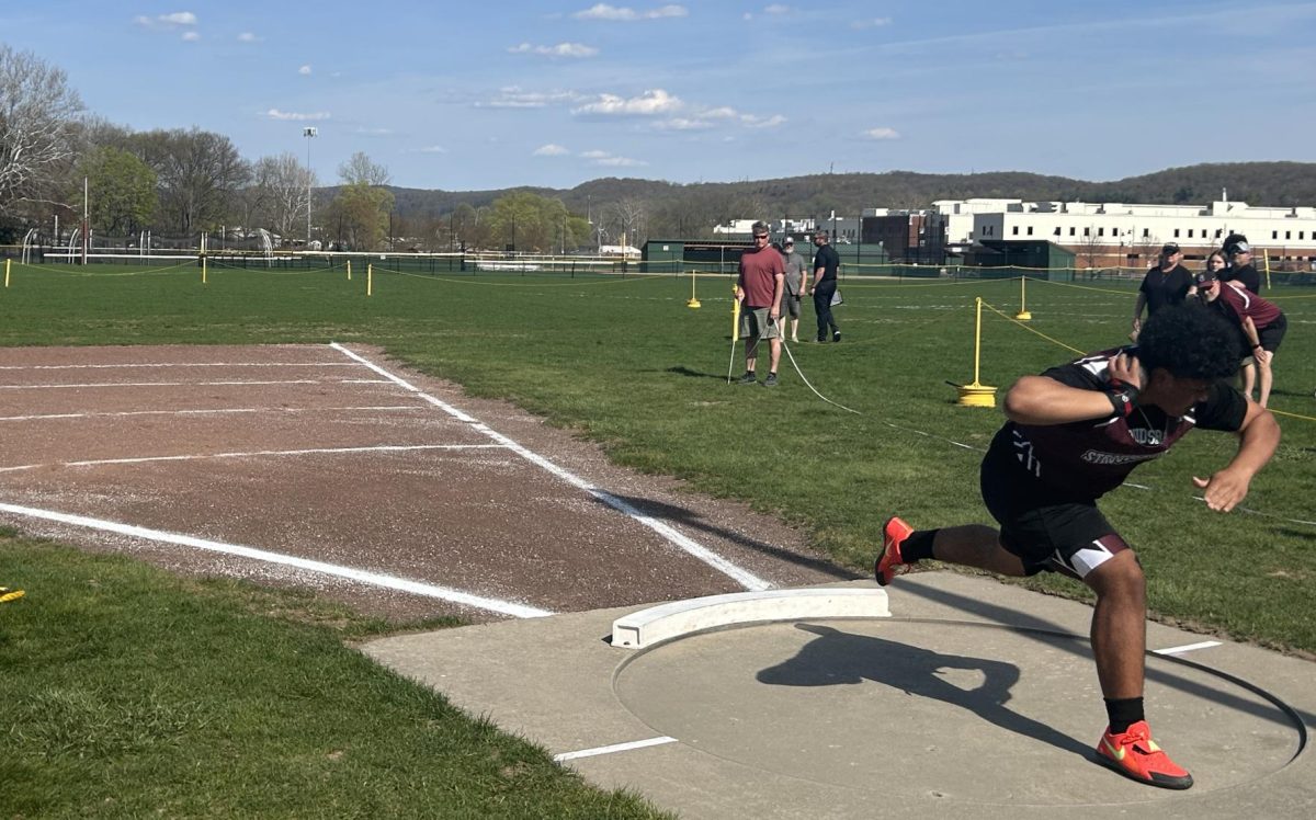Anthony Delgado, '25, preparing to go for his shot put attempt in his meet against East Stroudsburg South.