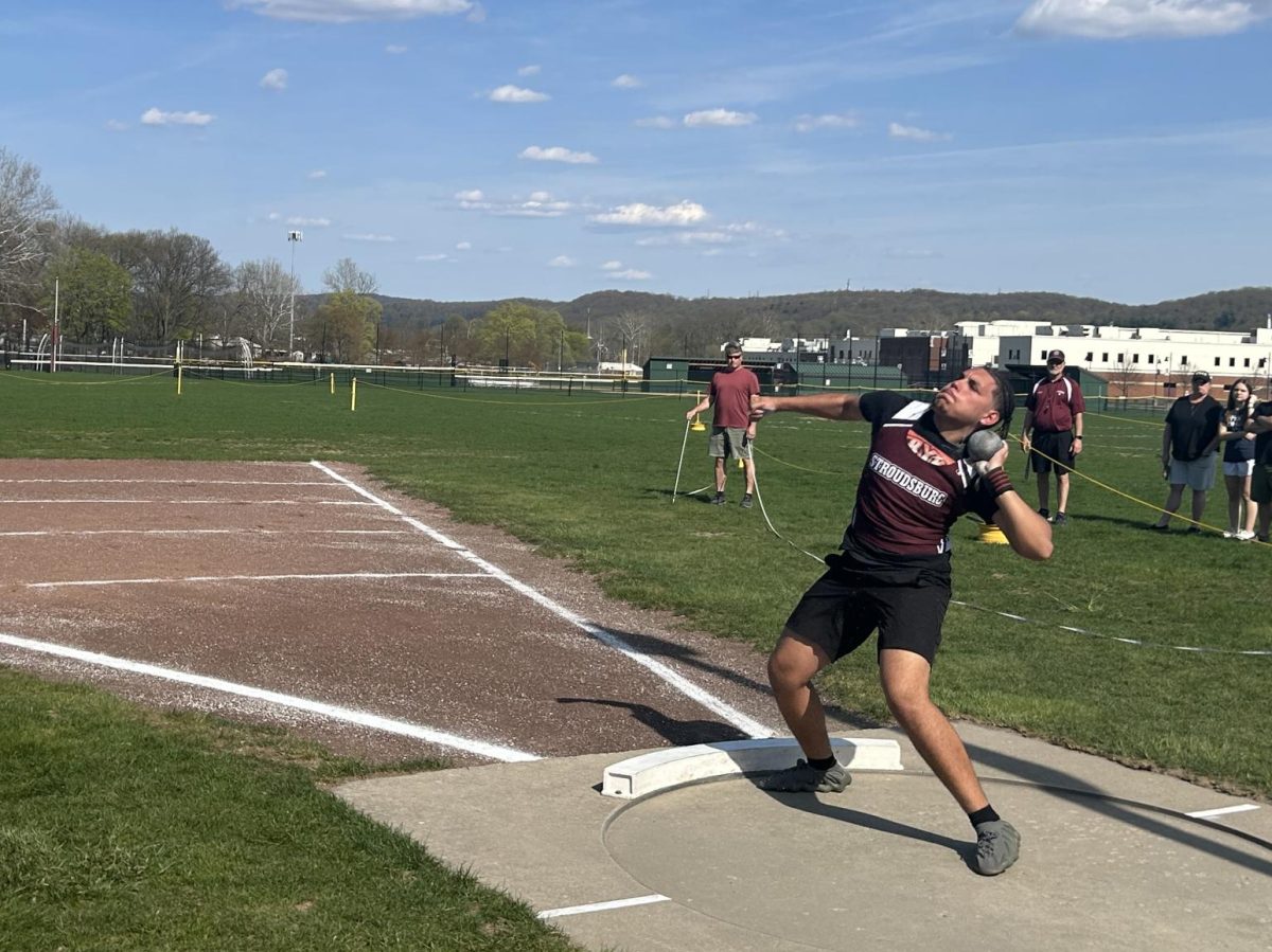 Armani Crespo, '25, tossing his second shot put in his meet against East Stroudsburg South.