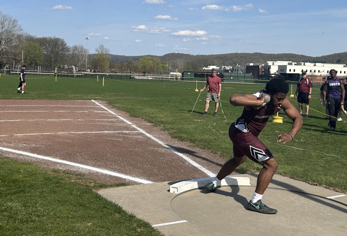 Mehki Kirkland, '25, getting ready to laugh his shot put against East Stroudsburg South.