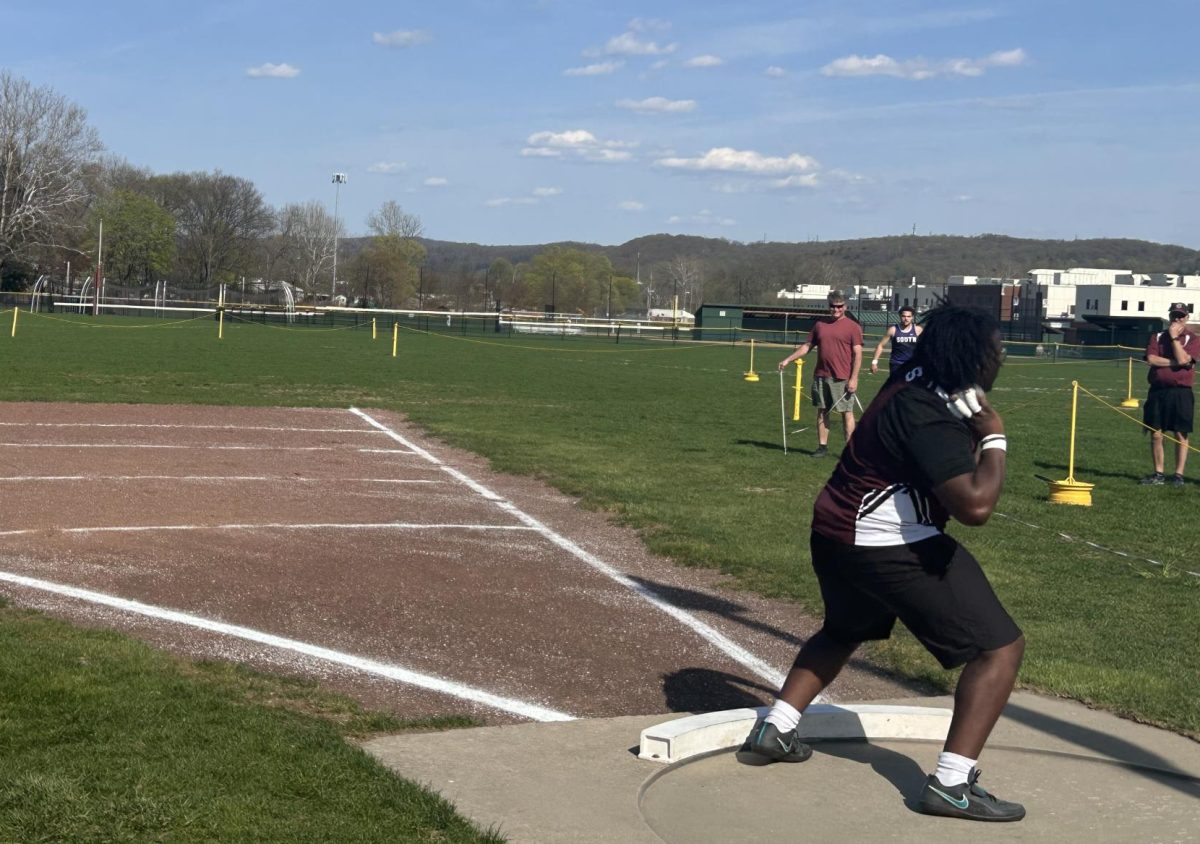 Xavier Bernard, '25, getting ready to throw his first attempt at the shot put against East Stroudsburg South.