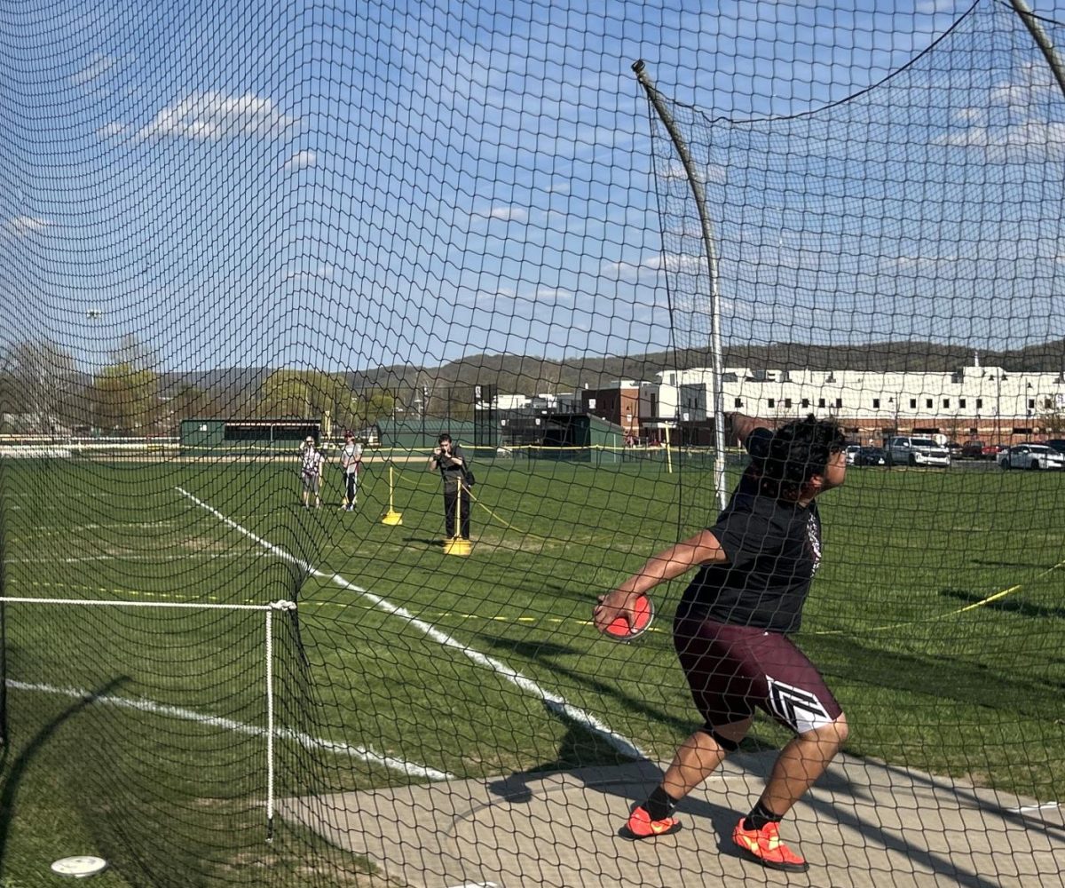 Anthony Delgado, '25, getting prepared to throw is discus against East Stroudsburg South.