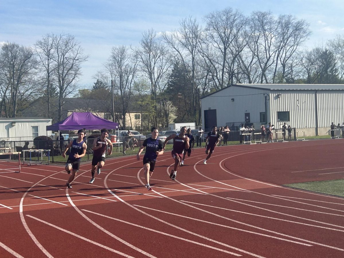 Sergio Teixeira, '26 and BLANK fight to earn a higher placement in the 800 sprint.