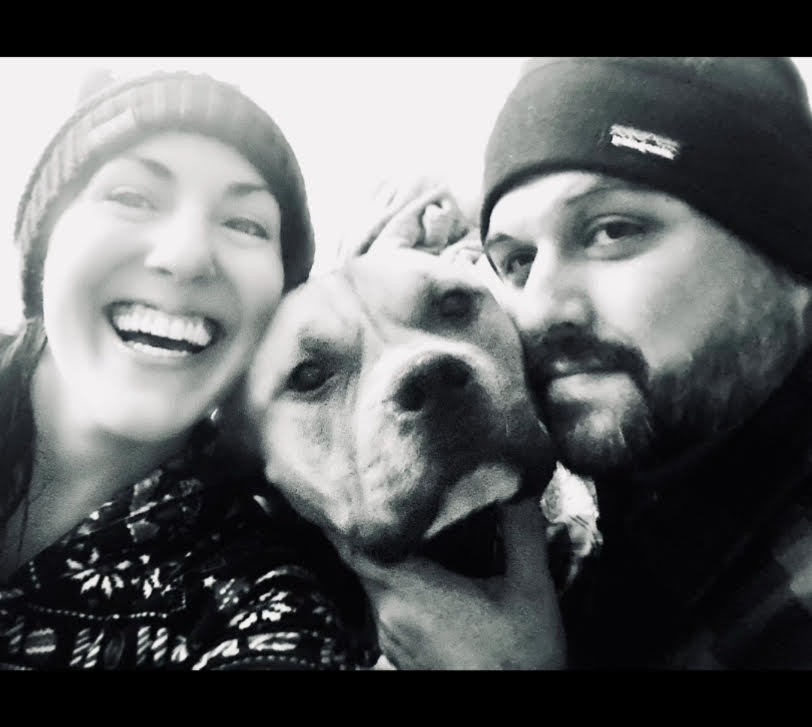 Special Education teacher, Mauri DeMartino, pictured with her dog, Manny, and husband. Photo contributed by M. DeMartino. 